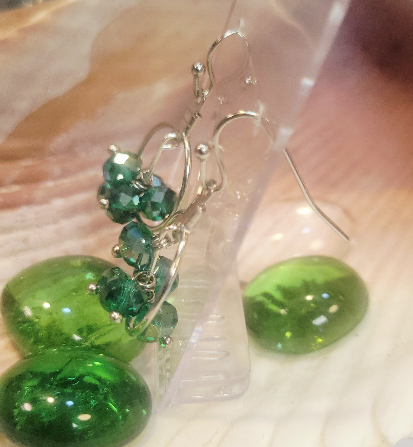 Faceted bead dangle inside hoop earrings