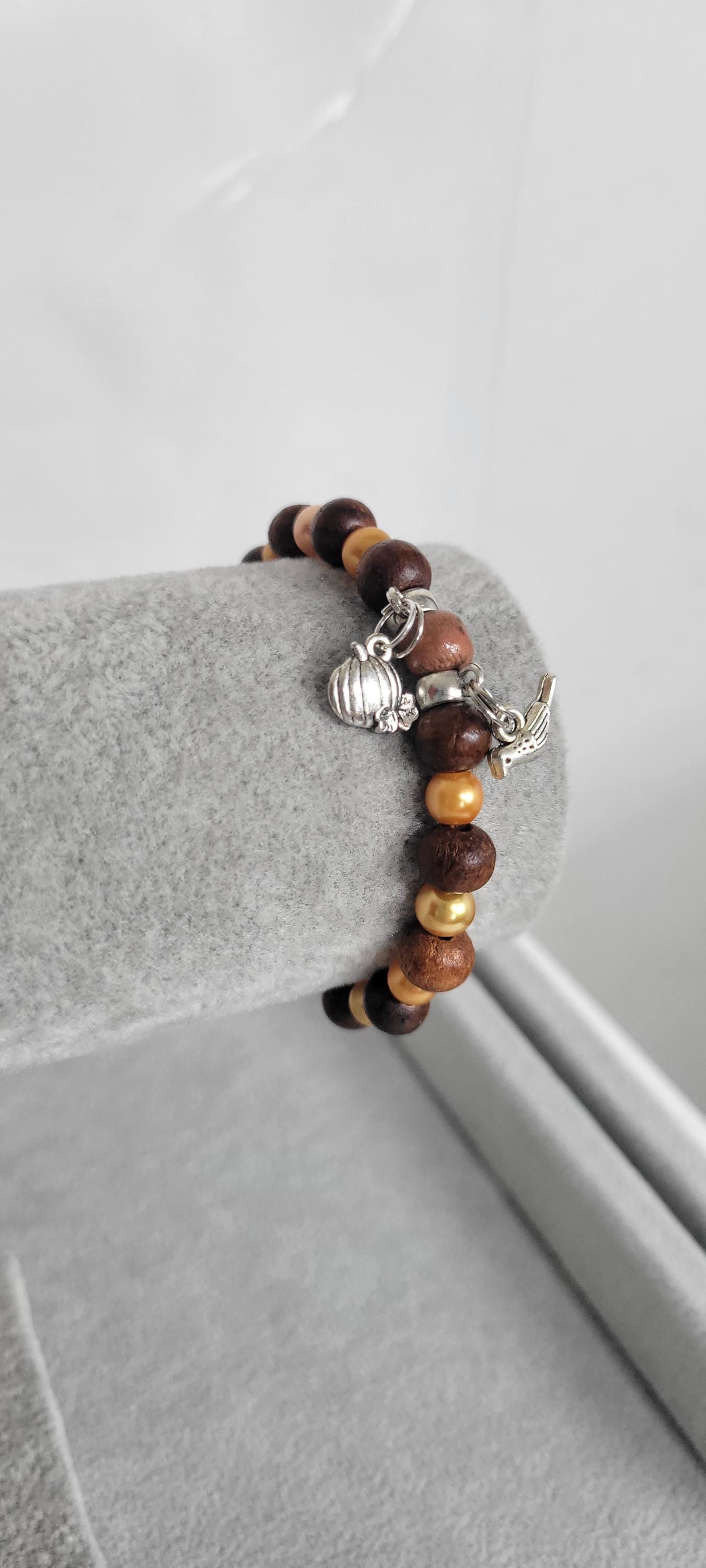 Autumn Fall glass and wood beaded pumpkin and bird charm bracelet