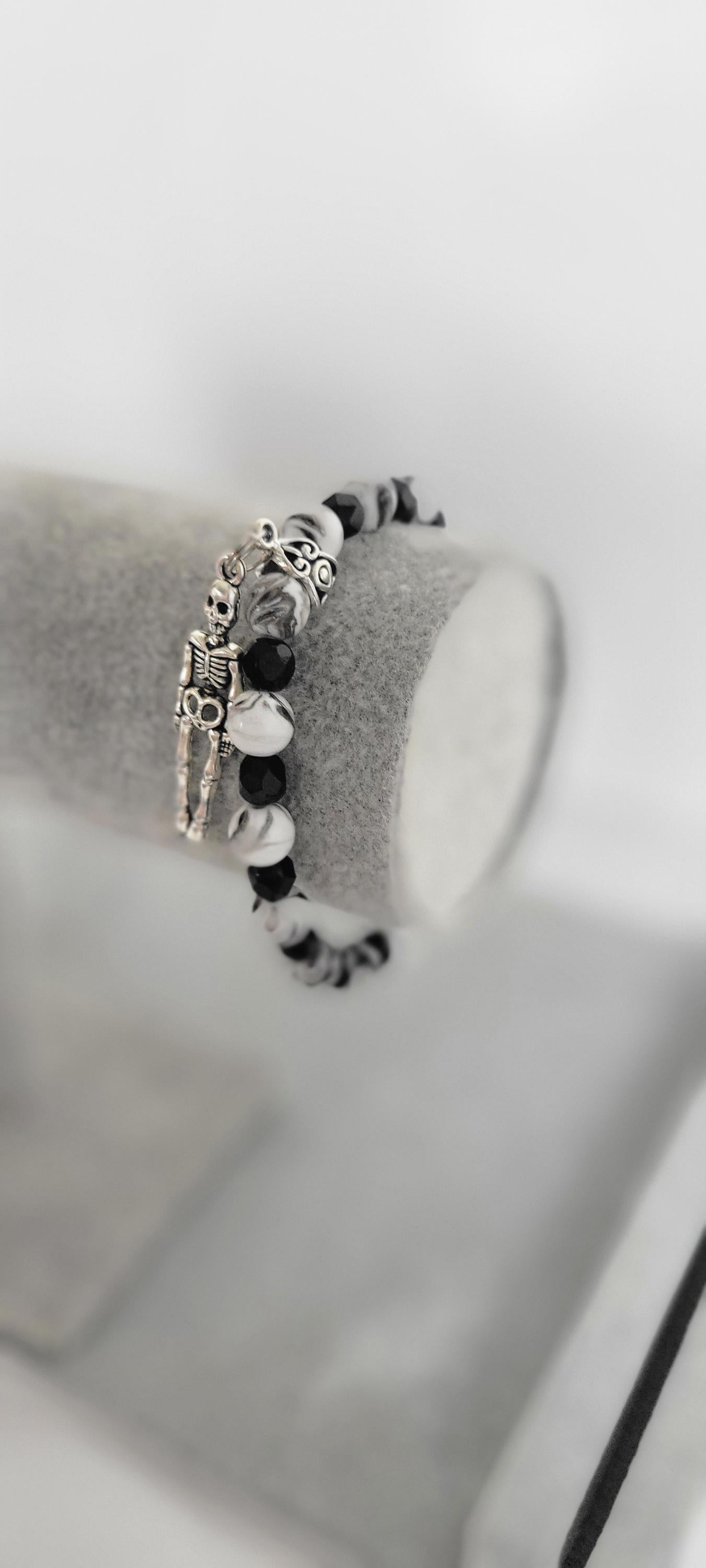 Hand crafted black & white crackle beaded skeleton charm bracelet