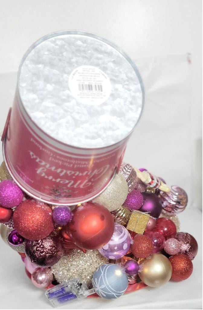 Artisanal made magical floating bucket pouring Christmas ornaments baubles