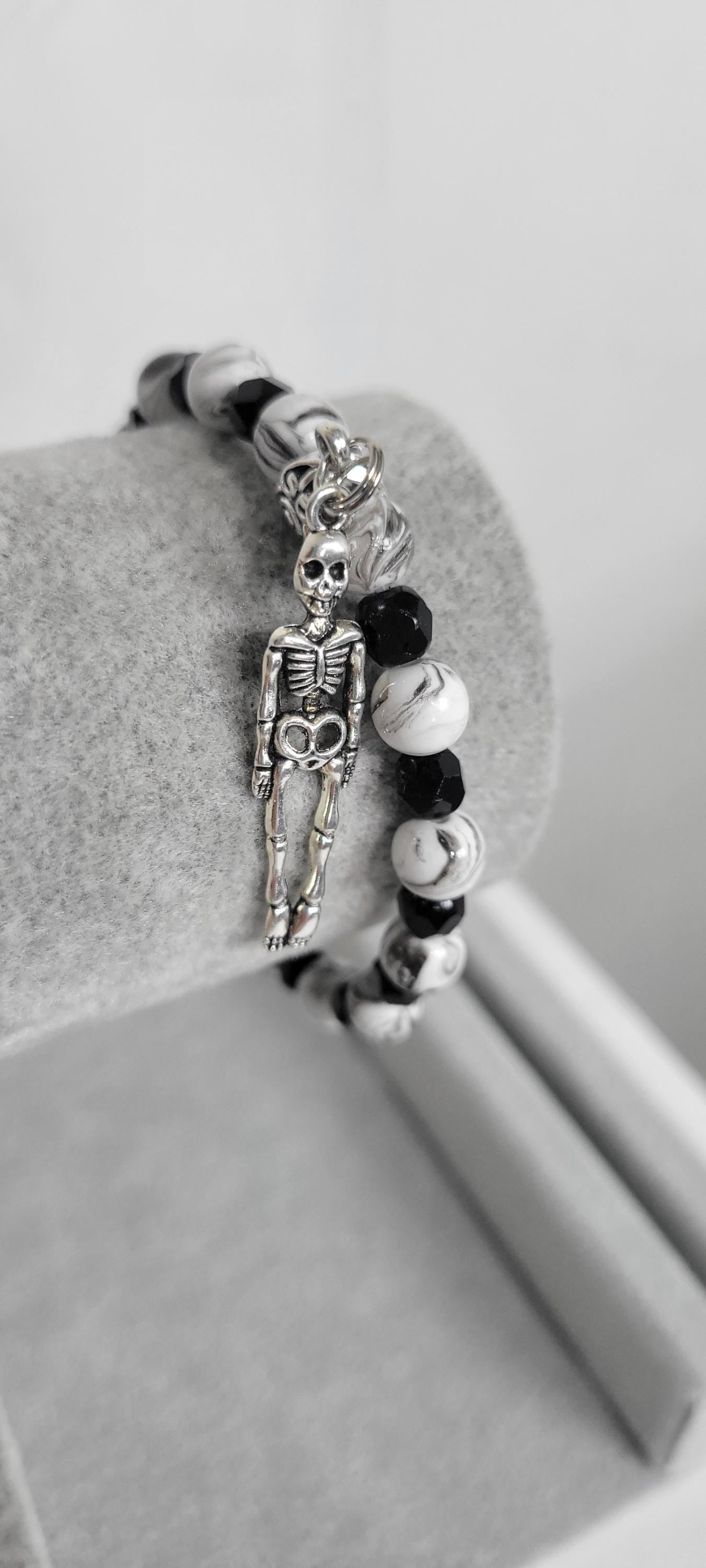 Hand crafted black & white crackle beaded skeleton charm bracelet