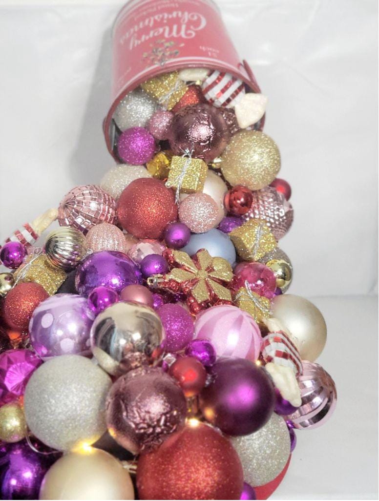 Artisanal made magical floating bucket pouring Christmas ornaments baubles