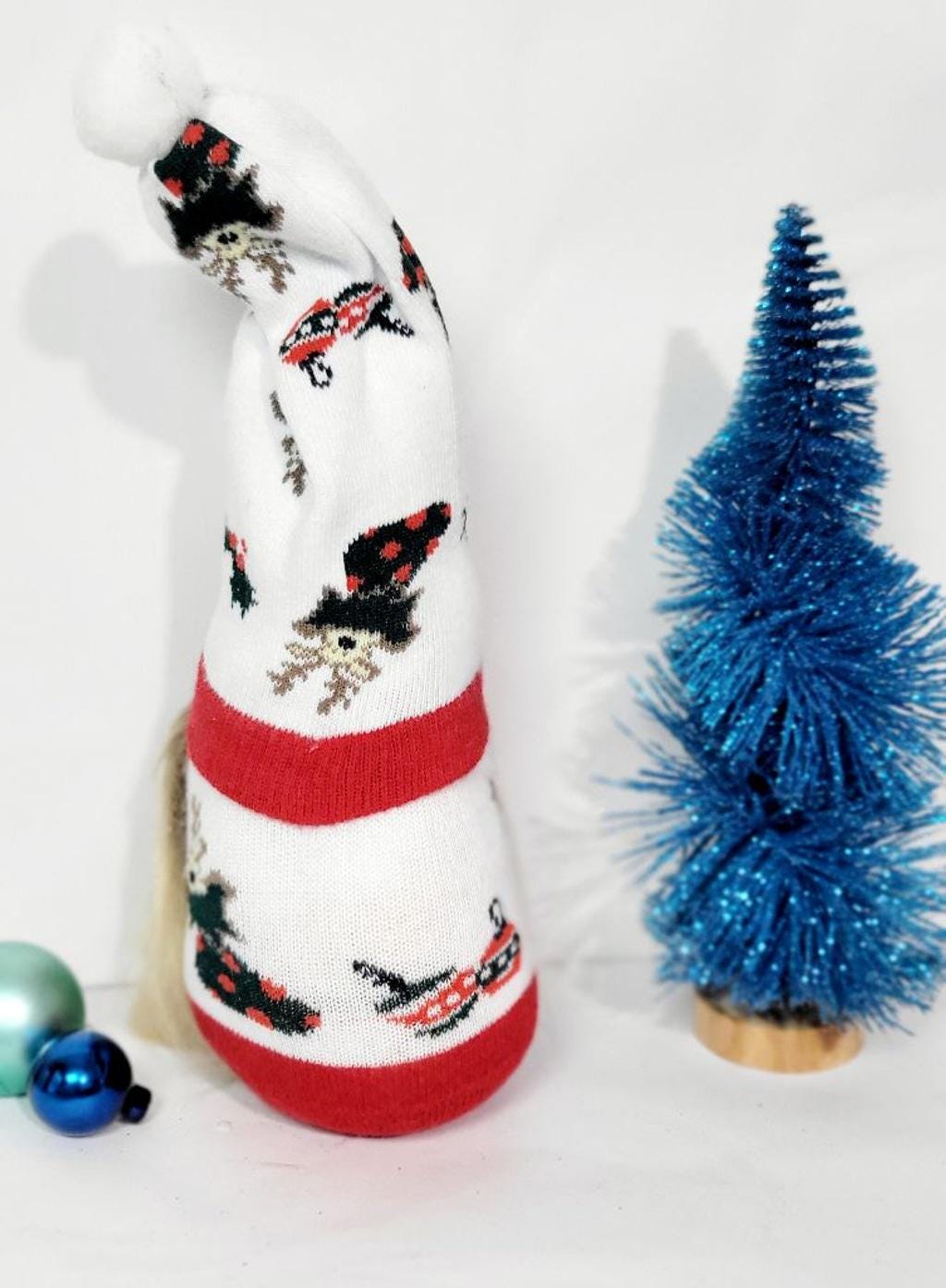 Hand crafted Christmas sock gnome with reindeer and mistletoe