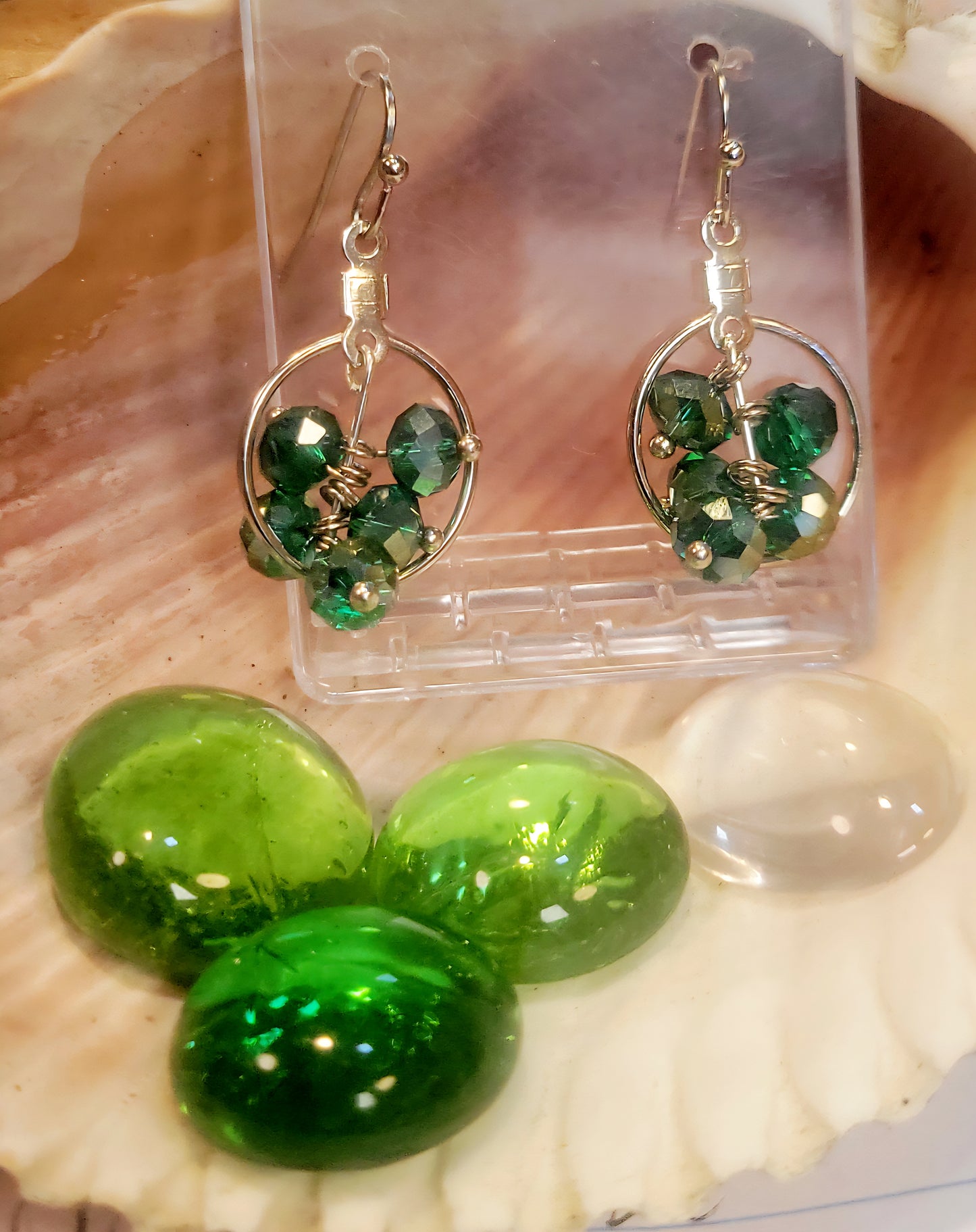 Faceted bead dangle inside hoop earrings