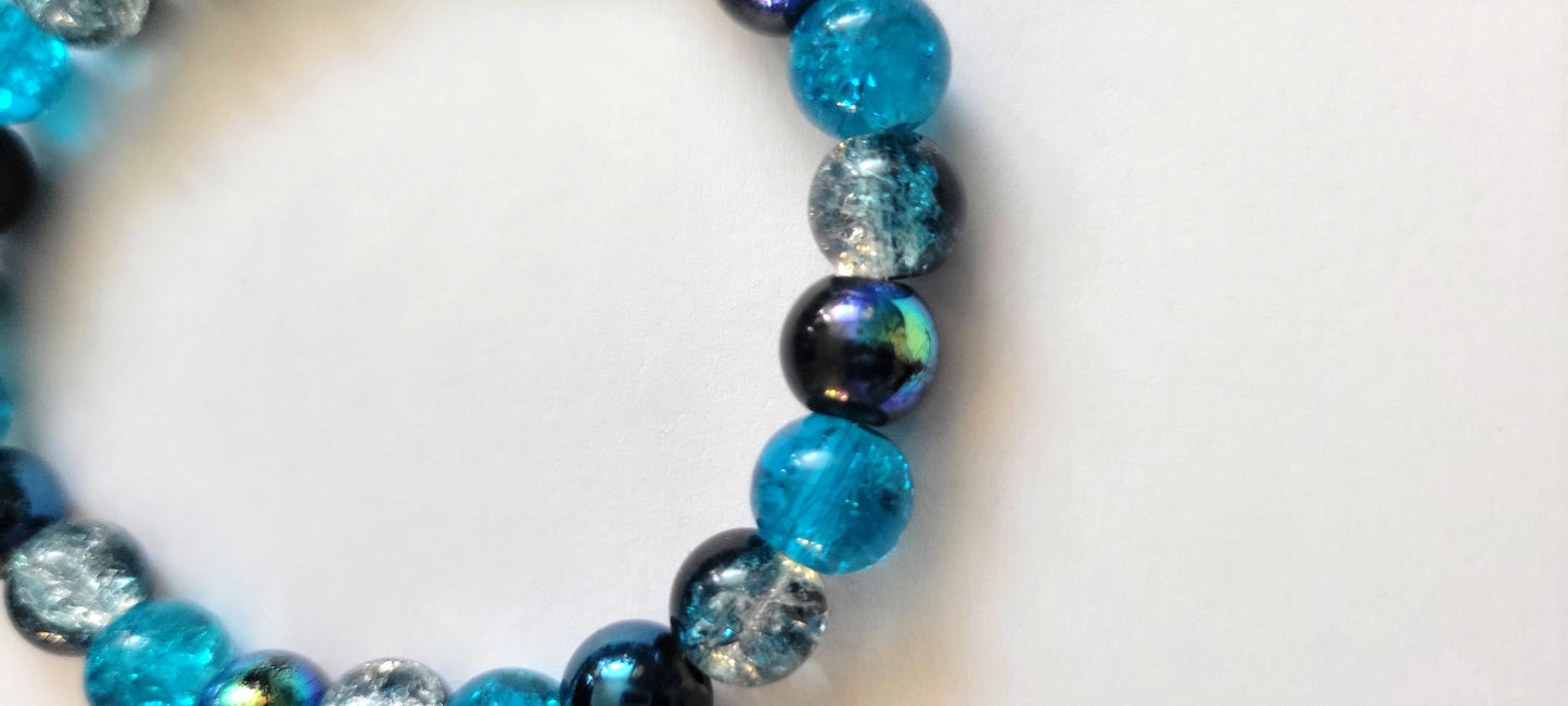 Aurora Borealis Blue 8mm Glass Beaded This beautiful two-toneStretch Bracelet 7"