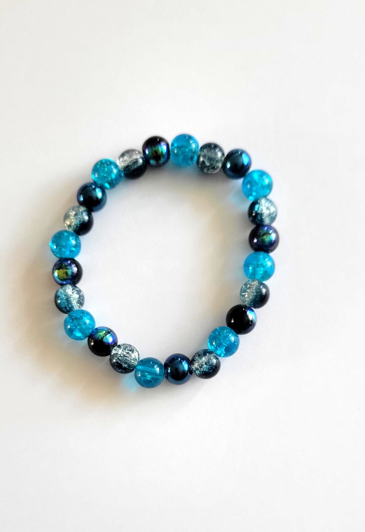 Aurora Borealis Blue 8mm Glass Beaded This beautiful two-toneStretch Bracelet 7"