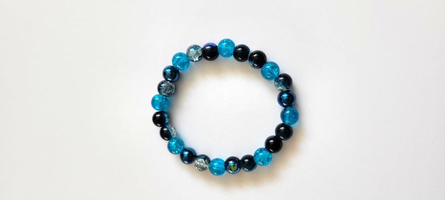 Aurora Borealis Blue 8mm Glass Beaded This beautiful two-toneStretch Bracelet 7"