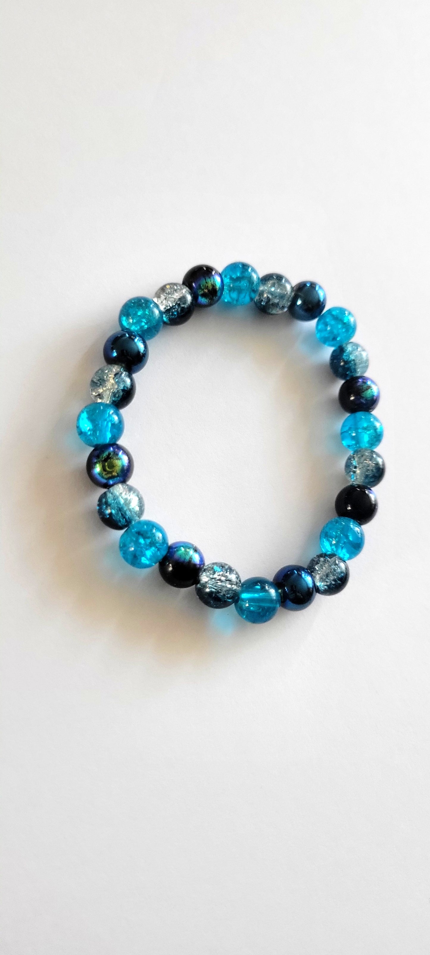 Aurora Borealis Blue 8mm Glass Beaded This beautiful two-toneStretch Bracelet 7"