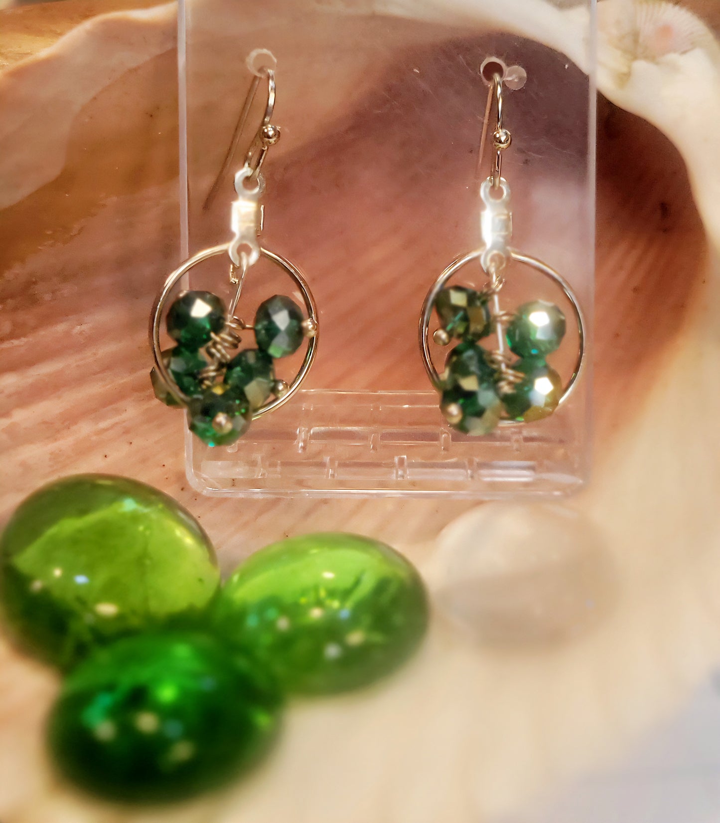 Faceted bead dangle inside hoop earrings
