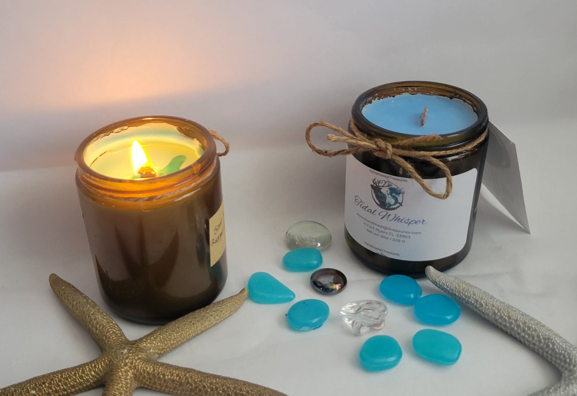 Artisan handpoured soy wax amber apothecary jar candle with wood wick burning and one unlit