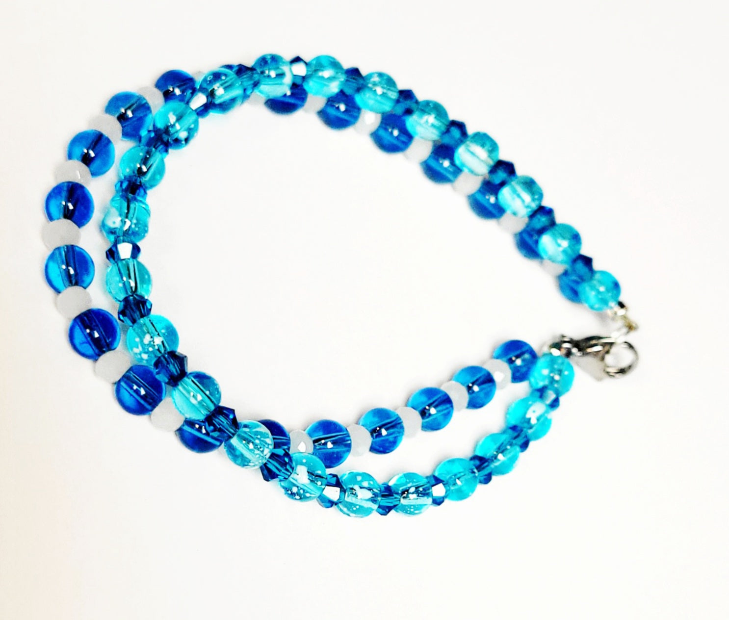 Double stranded blue glass faceted AB Bicone beaded bracelet 