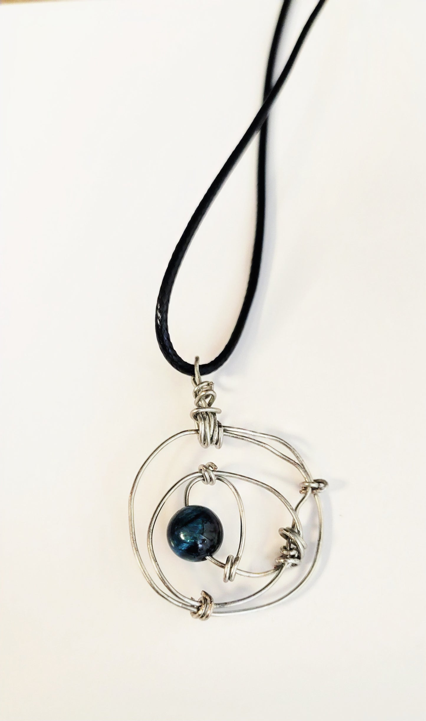 Minimalist knotted wire necklace with dragon vein agate bead