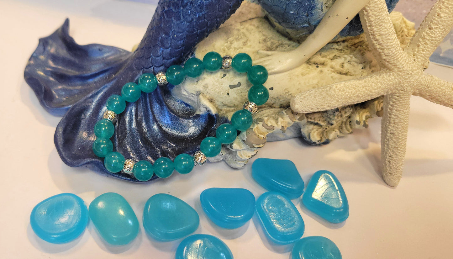 Tropical Teal Mermaid Lagoon Bracelet - Features vibrant teal agate-style beads and shimmering silver accents inspired by clear ocean waters.