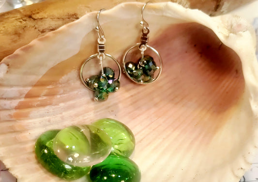 Faceted bead dangle inside hoop earrings